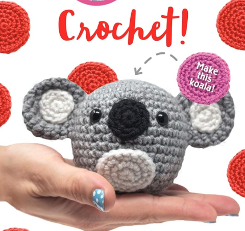 A tiny crocheted koala bear