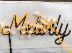 Neon Sign saying Melody