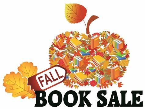 books in the shape of a pumpkin with fall book sale text