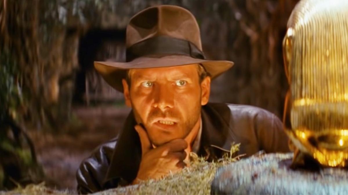 Indiana Jones trying to solve a puzzle