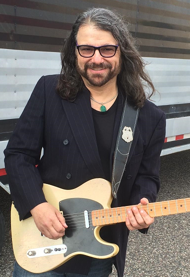 man holding a guitar