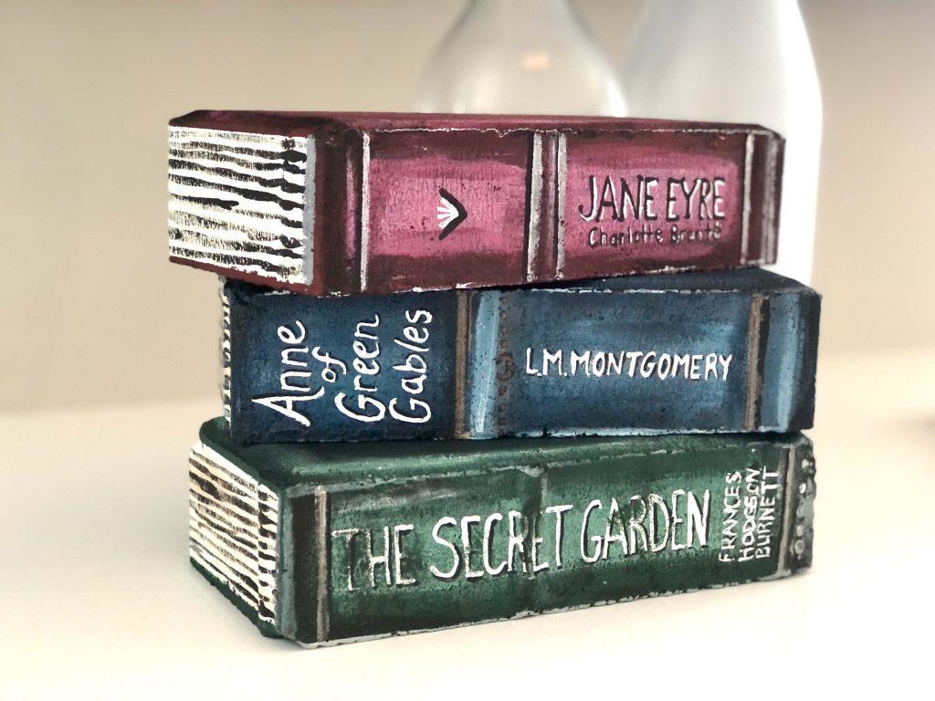 Brick painted to look like a book
